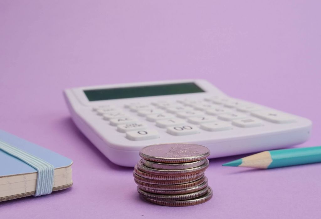 Calculadora lápiz monedas